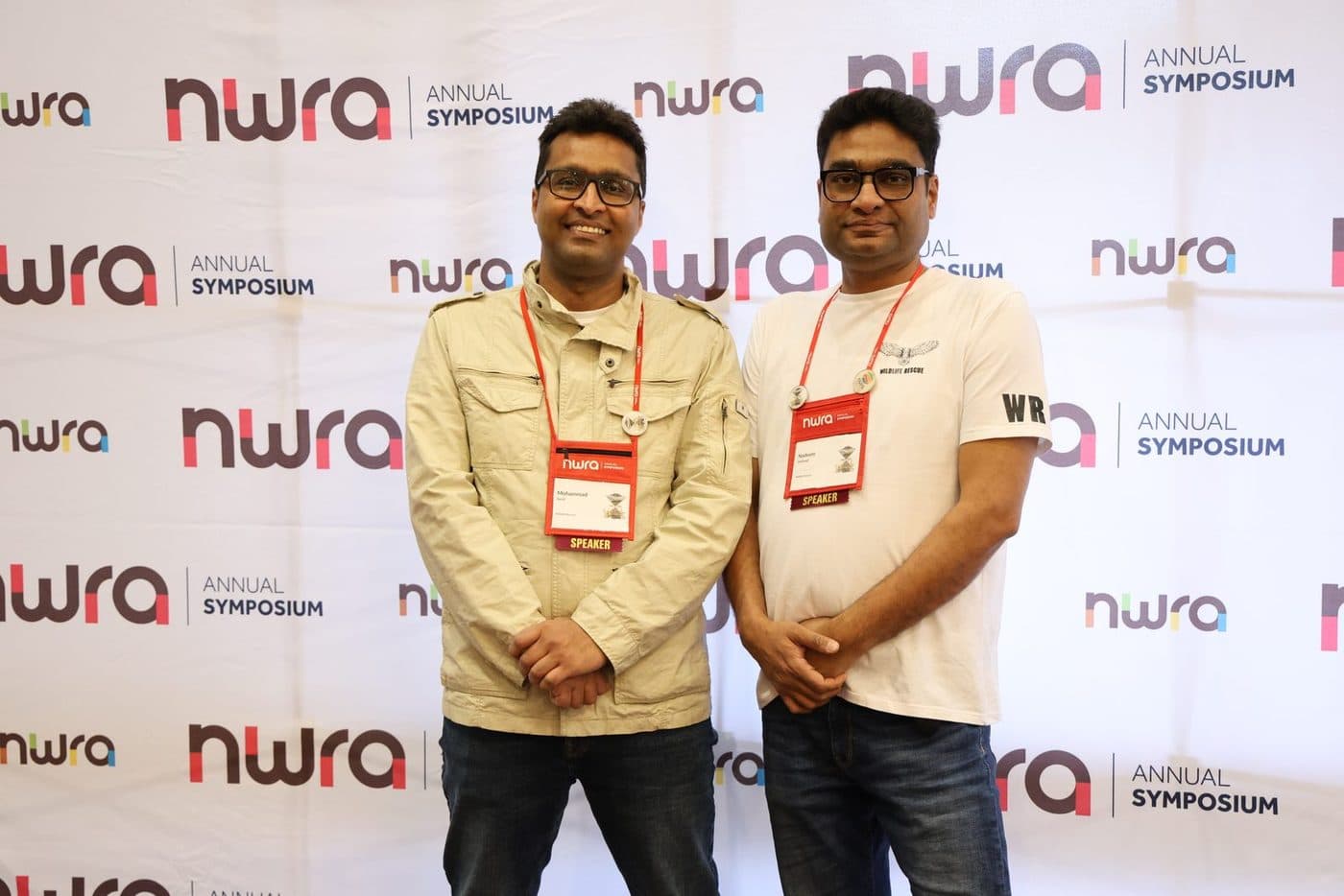 Mohammad Saud and Nadeem Shehzad wearing speaker badges at the NWRA Annual Symposium